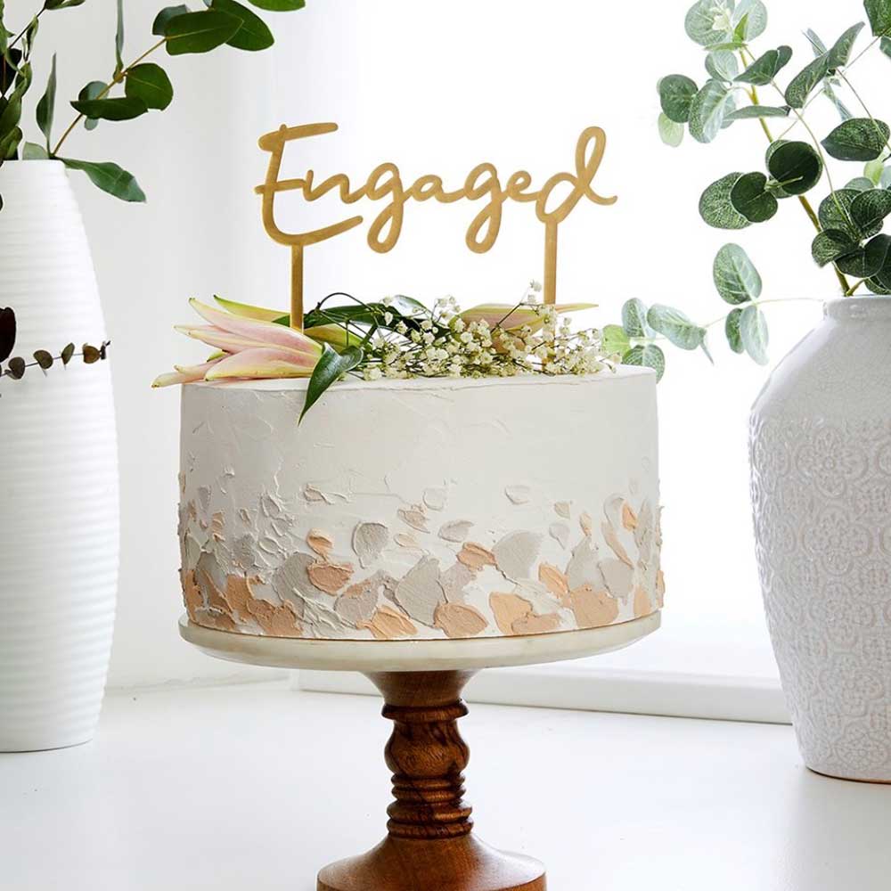 Gold acrylic engaged cake topper